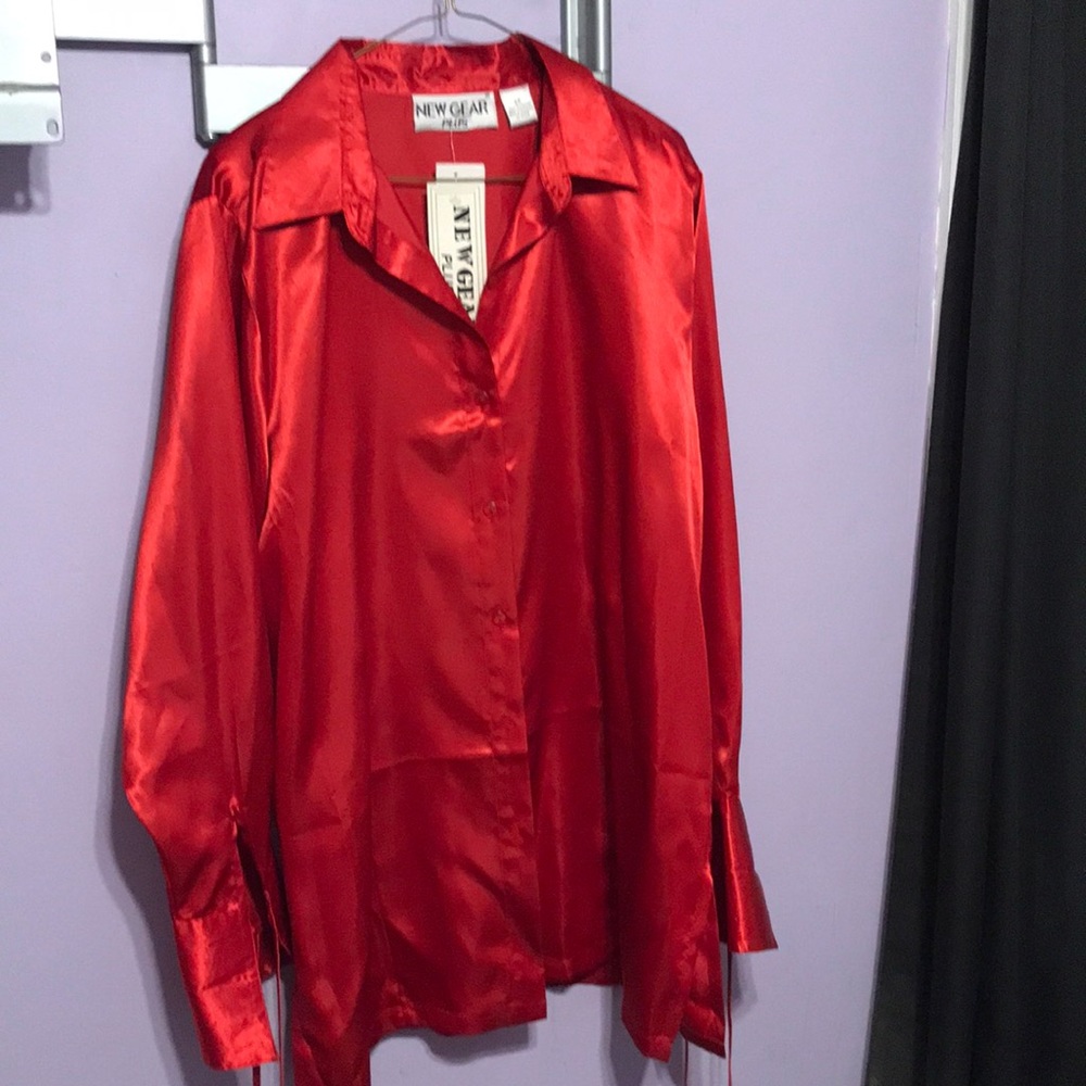 Plus size red blouse.